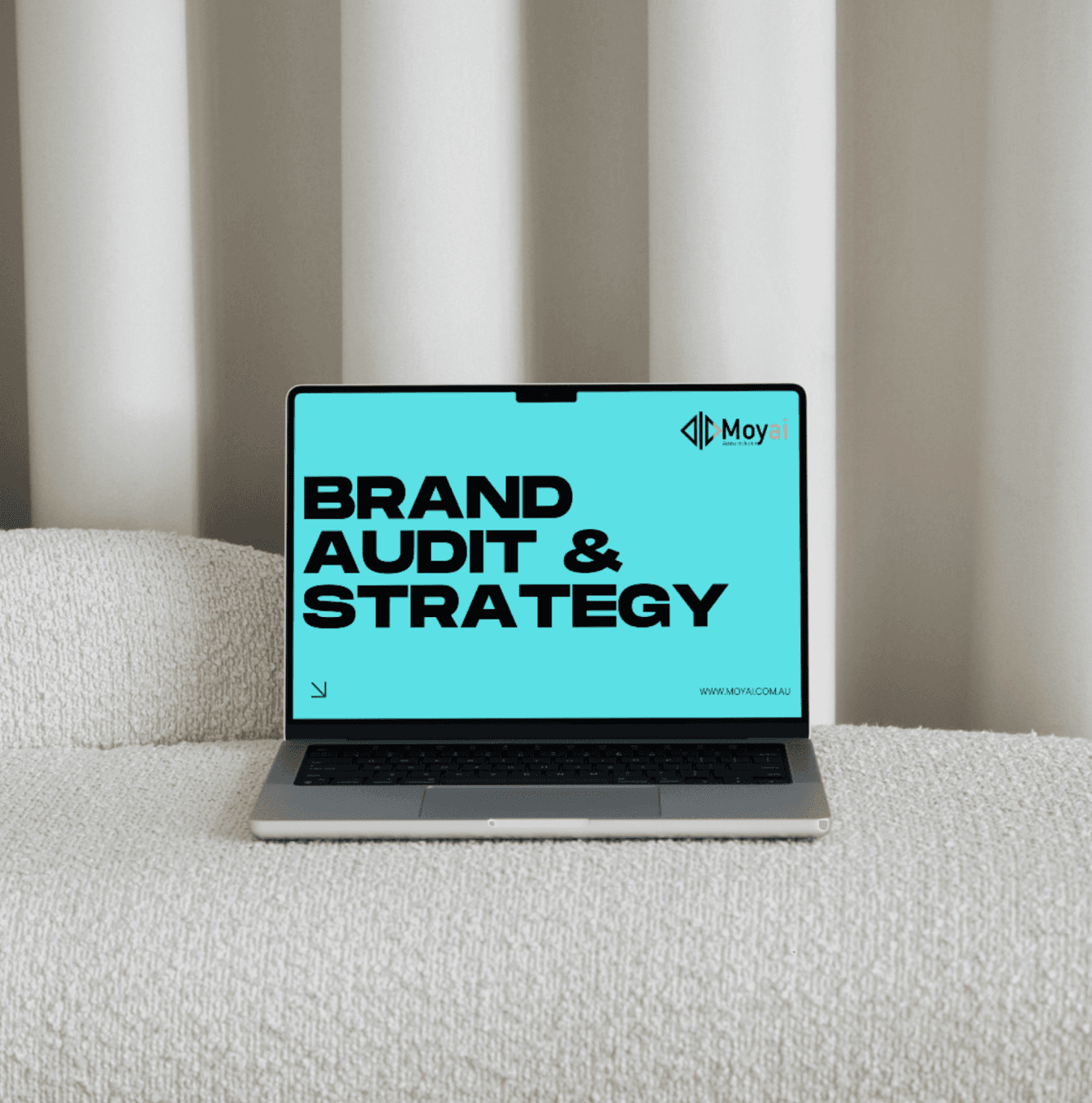 Moyai brand audit and strategy on a laptop