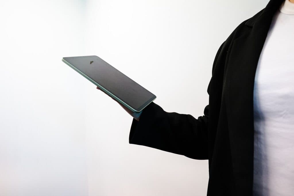 Person holding out a laptop