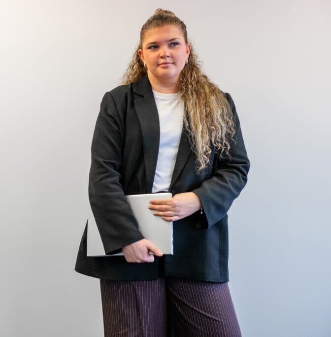 Brink team member holding a notebook